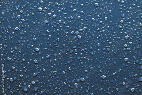 Raindrops on blue background