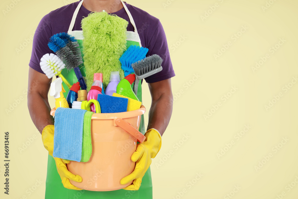 Portrait of man with cleaning equipment Portrait of man with cleaning equipment