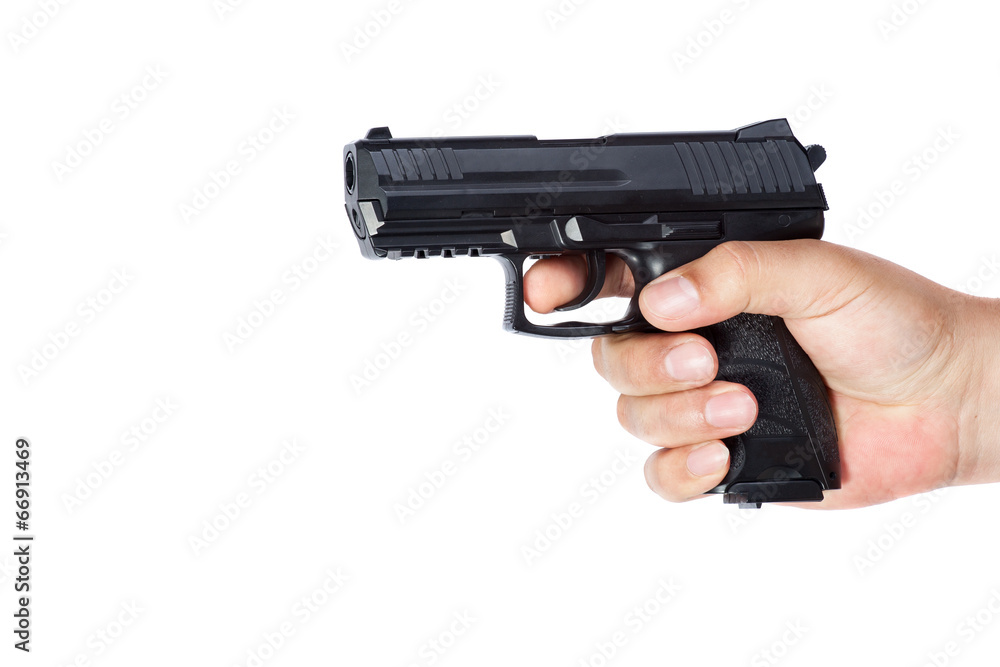 Gun in the hand isolated on white background Gun in the hand isolated on white background