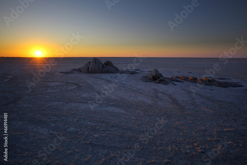 Rocks on Sua Pan at sunset photo