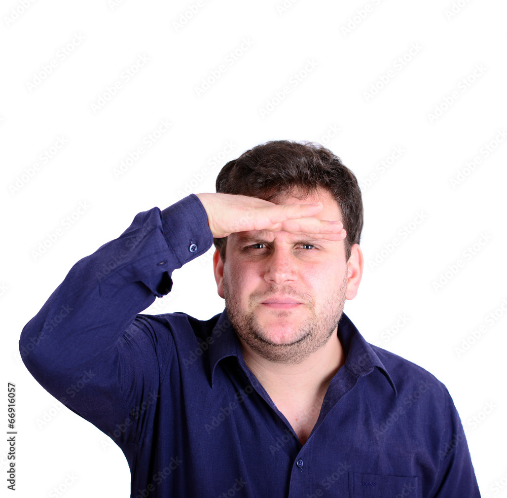 Portrait of a young chubby serious man with hand to head peering Portrait of a young chubby serious man with hand to head peering