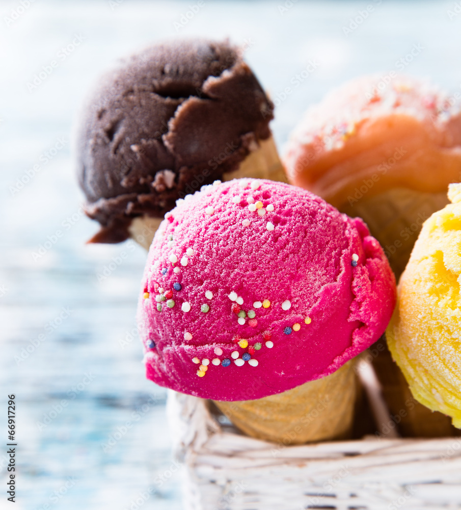 Ice cream scoops on wooden table. Ice cream scoops on wooden table.