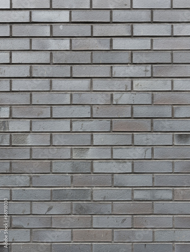 Gray brick wall as background