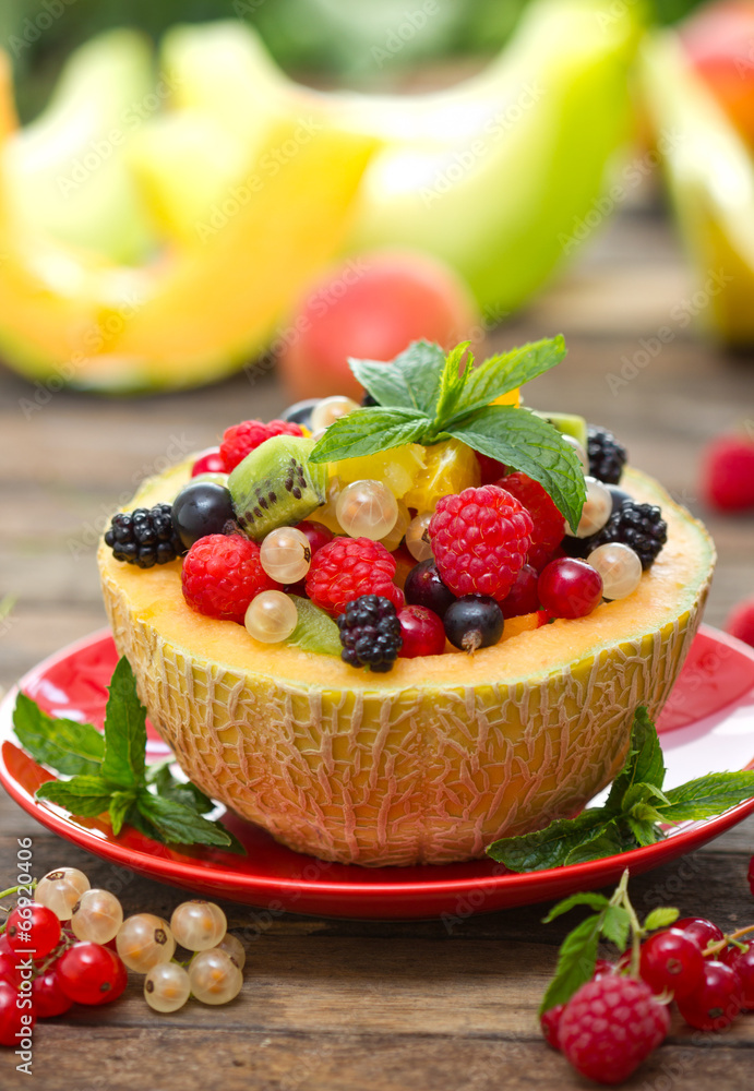 Fresh fruit salad in the melon Fresh fruit salad in the melon