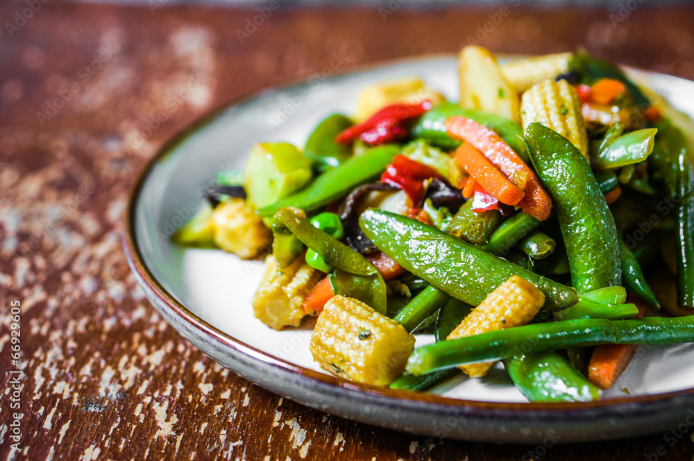 Baked vegetables on rustic background Baked vegetables on rustic background