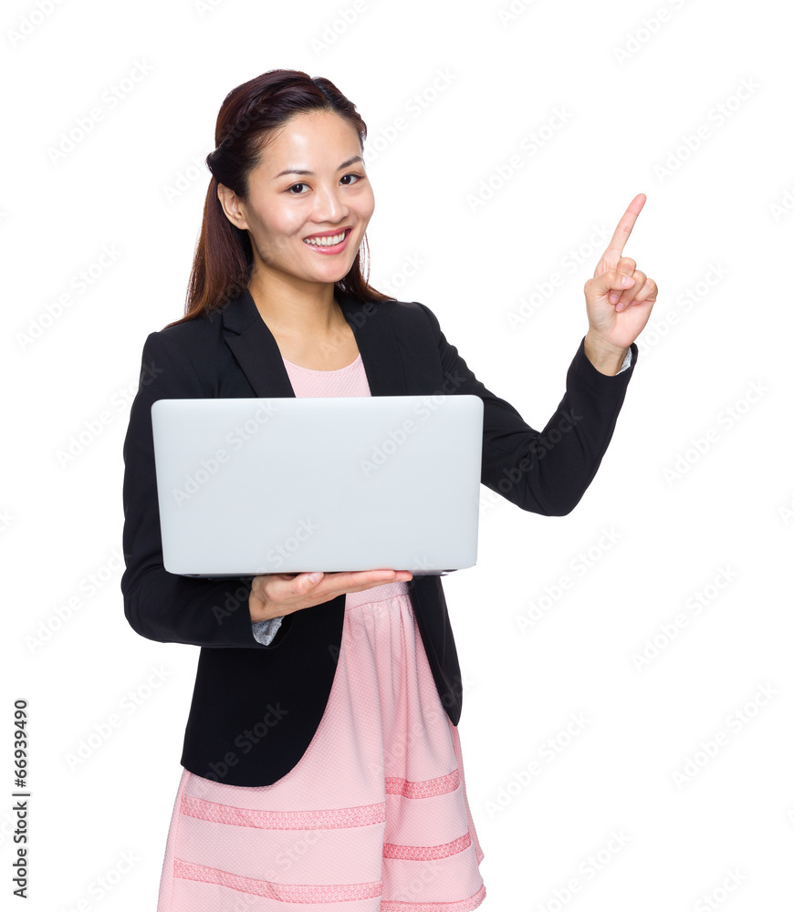Business woman with laptop computer and finger point out Business woman with laptop computer and finger point out