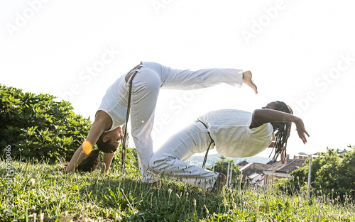 Capoeira woman, awesome stunts in the outdoors