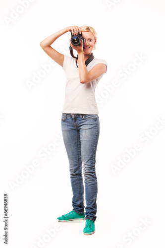 Woman-photographer takes images, on white background