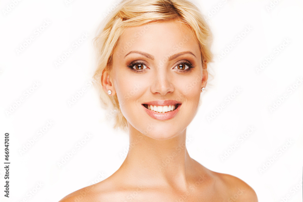 Portrait of beautiful smiling woman on white background
