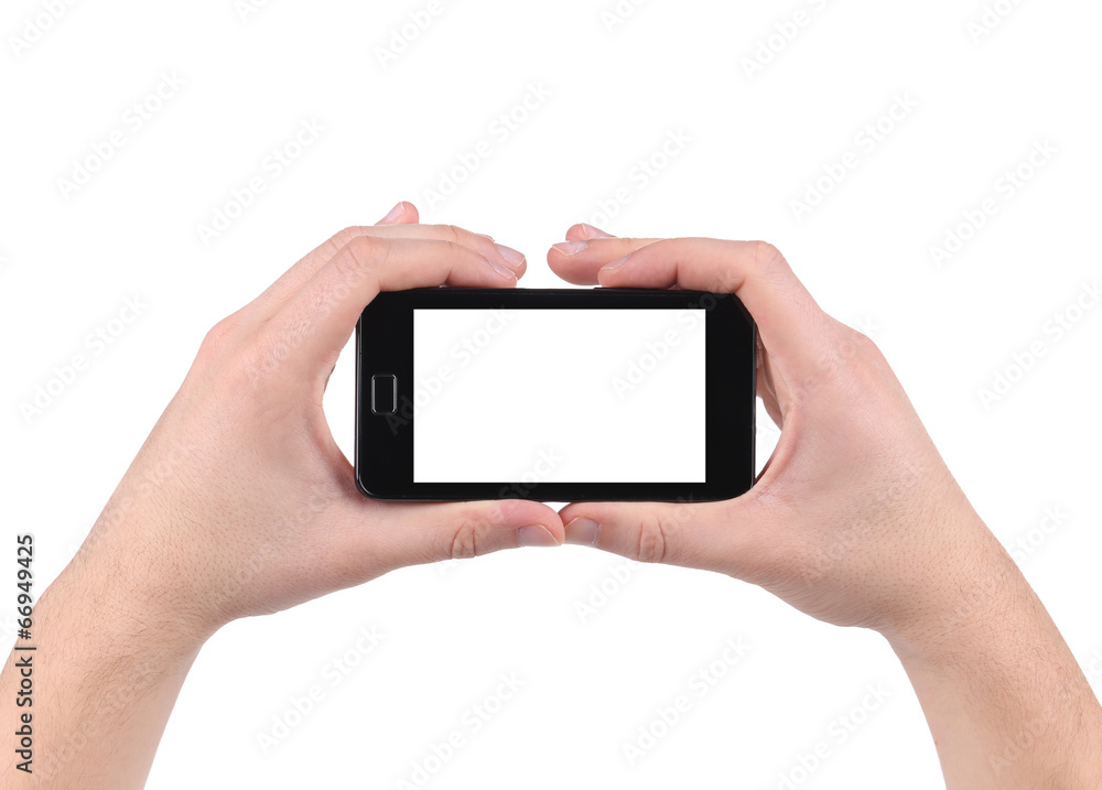 Hand holds cell phone with clipping path. Hand holds cell phone with clipping path.
