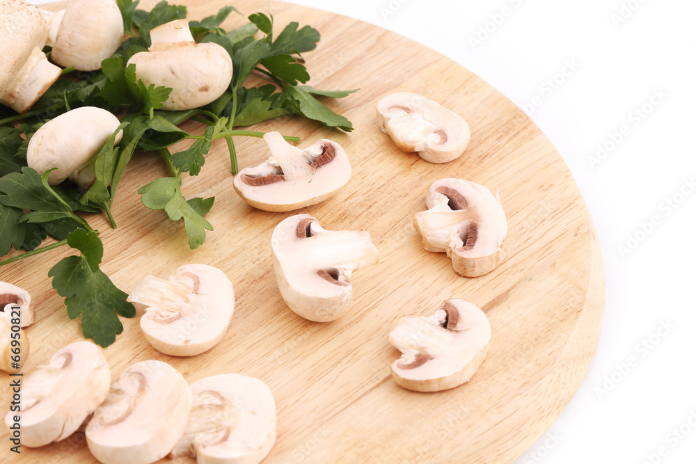 Sliced mushrooms on platter.