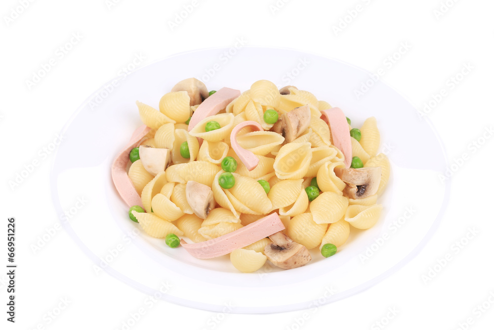Pasta shells with vegetables on white plate. Pasta shells with vegetables on white plate.