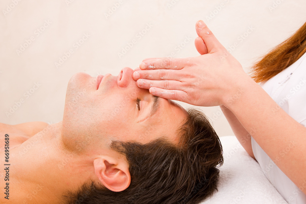 Handsome man the spa getting a facial Handsome man the spa getting a facial