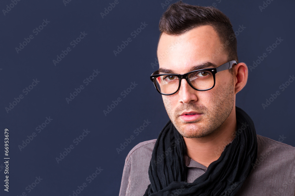 Fototapeta premium handsome young fashion man wearing scarf - shot in studio