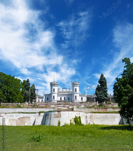 The White Swan palace on sky background. Sharovka, Ukraine. photo