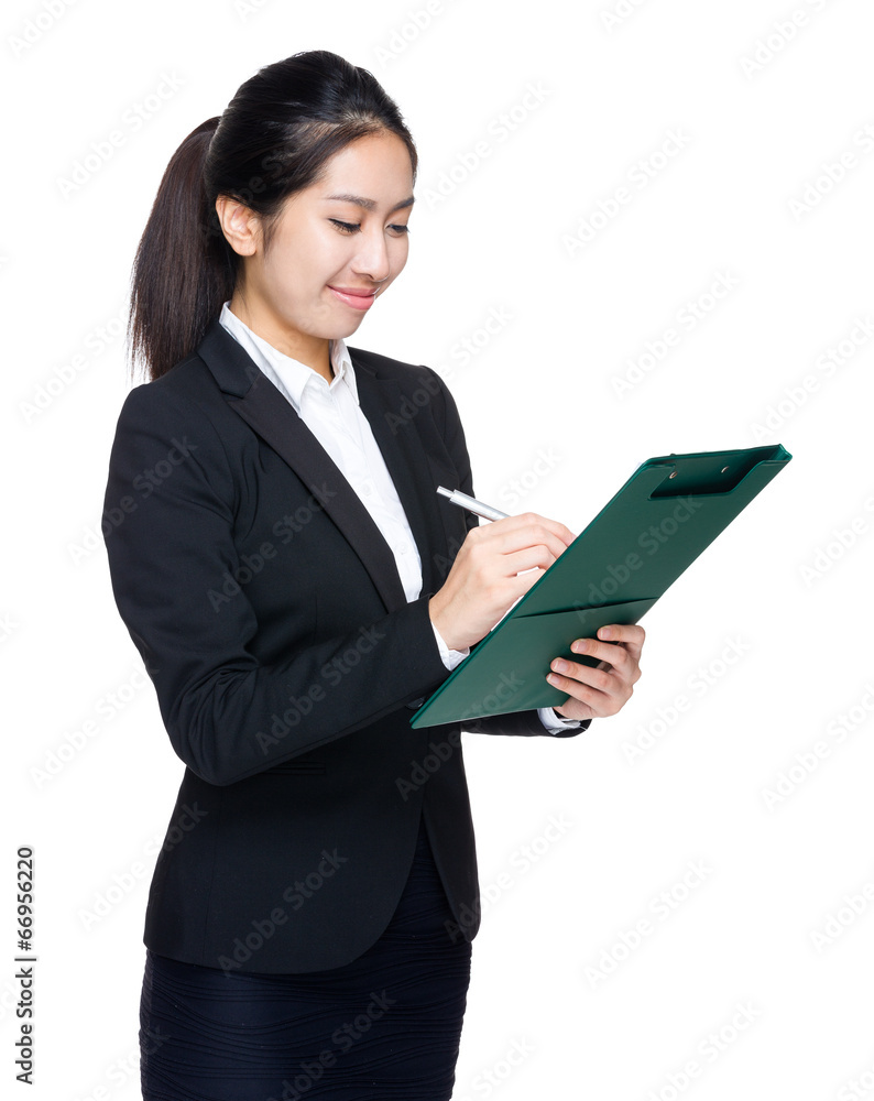 Business woman write on clipboard Business woman write on clipboard