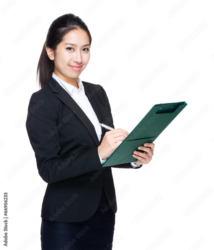 Business woman write on clipboard Business woman write on clipboard