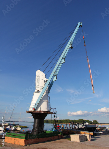 Crane for lowering and lifting the yachts and boats in the water