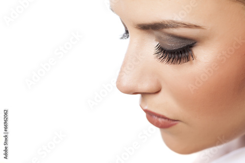 portrait of young beautiful woman with fake eyelashes