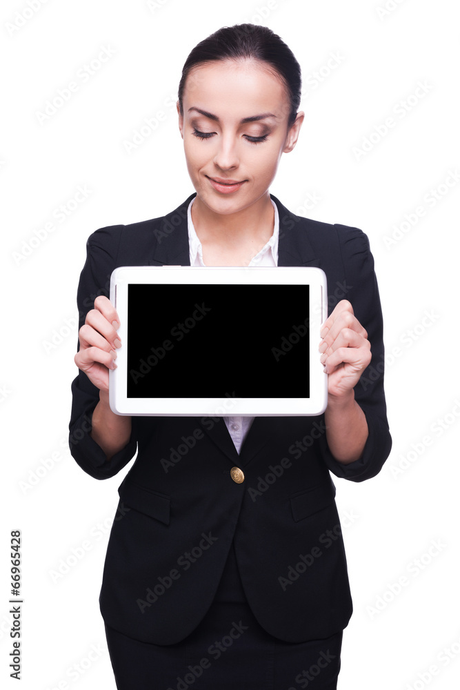 Copy space on her digital tablet. Copy space on her digital tablet.