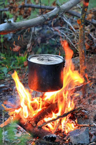 kettle on tourist camp fire