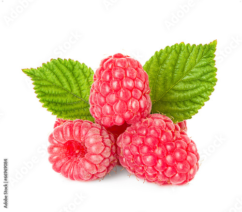 Raspberries with leaves isolated on white background