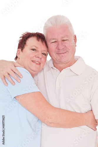 Happy seniors couple in love isolated over white background