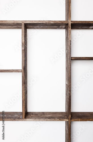 Rustic style shelves on white wall