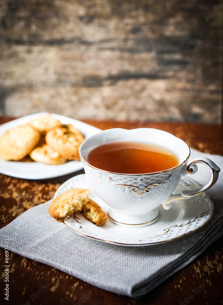 Tea with cookies on wooden background Tea with cookies on wooden background