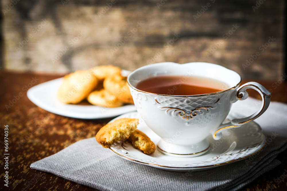 Tea with cookies on wooden background Tea with cookies on wooden background