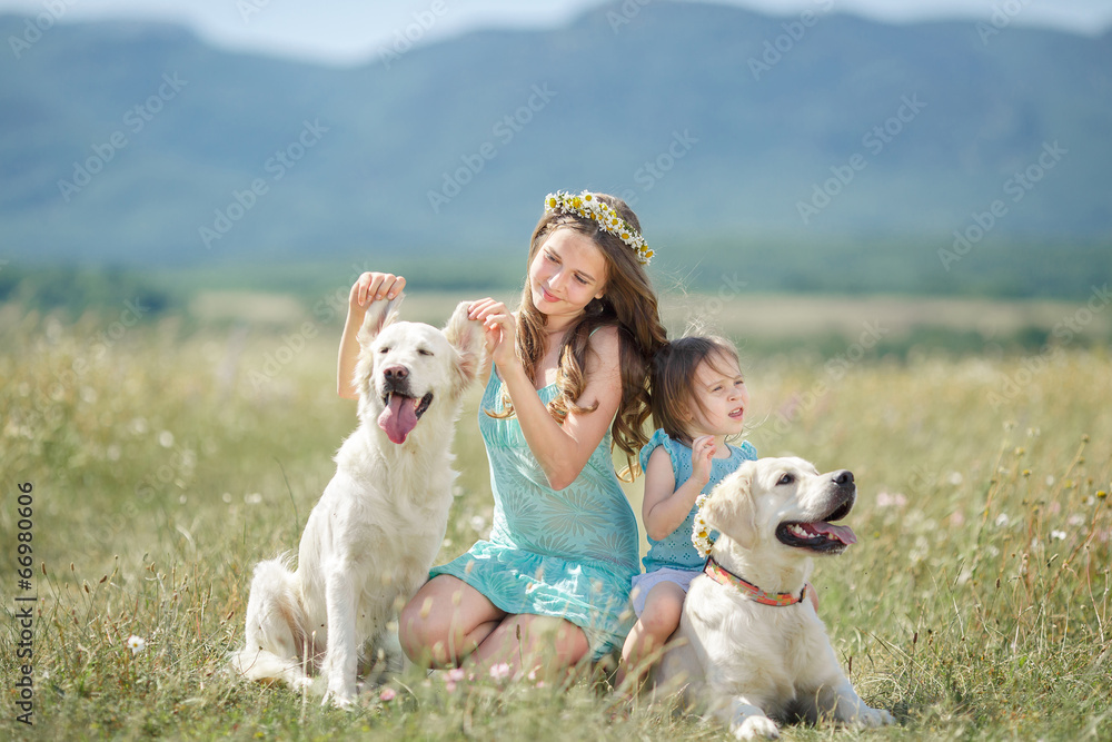 Beautiful girl playing with her dog. Outdoor portrait. Beautiful girl playing with her dog. Outdoor portrait.