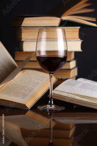 Wine glass and books