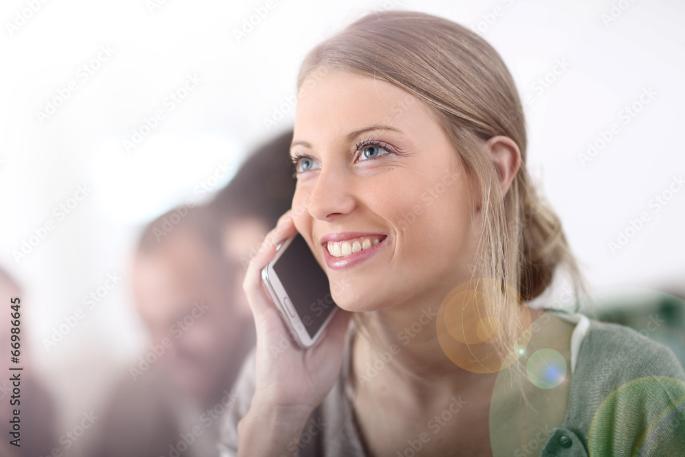 Portrait of attractive young woman using cellphone Portrait of attractive young woman using cellphone