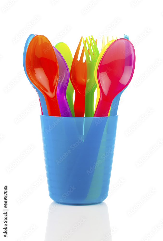 bright plastic tableware, isolated on white background bright plastic tableware, isolated on white background