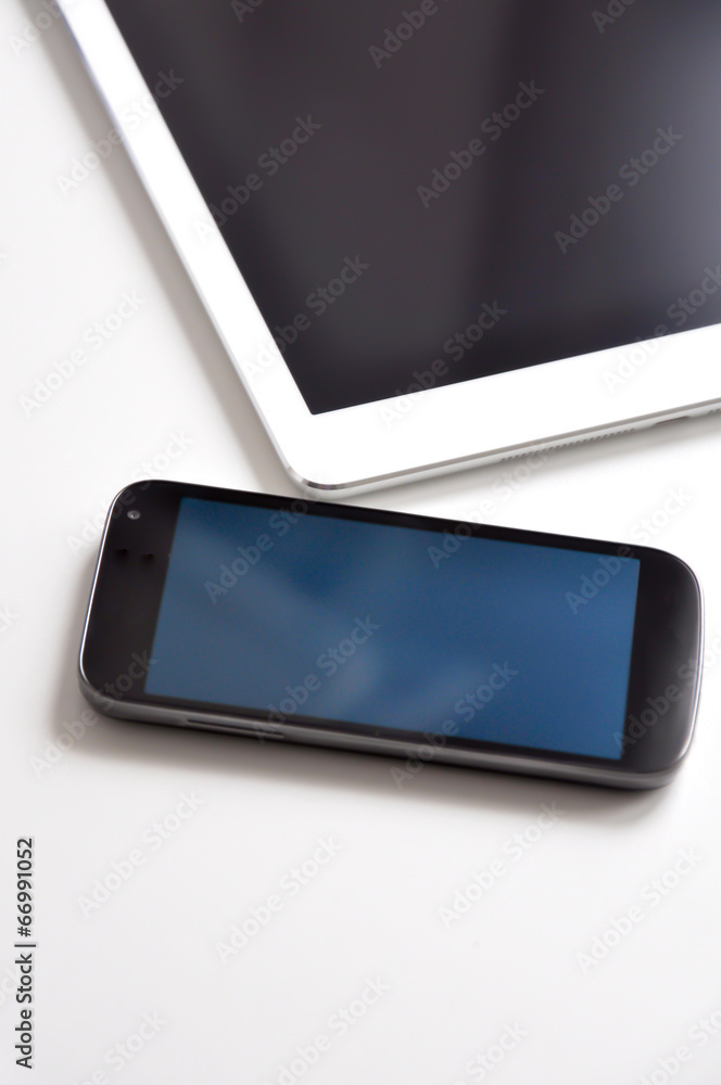 Tablet and mobile phone or smartphone on white background Tablet and mobile phone or smartphone on white background