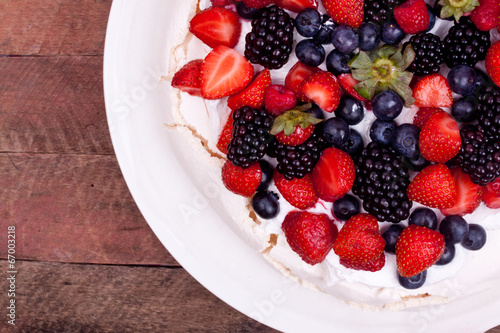 pavlova cake with berry fruits