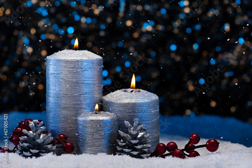Three Silver Candles in snow