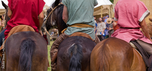 Three Horsemen during a Roman Reenactment