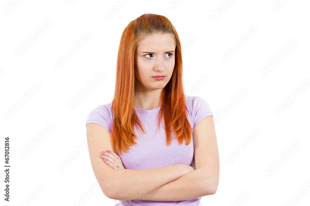 Grumpy, jealous young woman isolated on white background Grumpy, jealous young woman isolated on white background