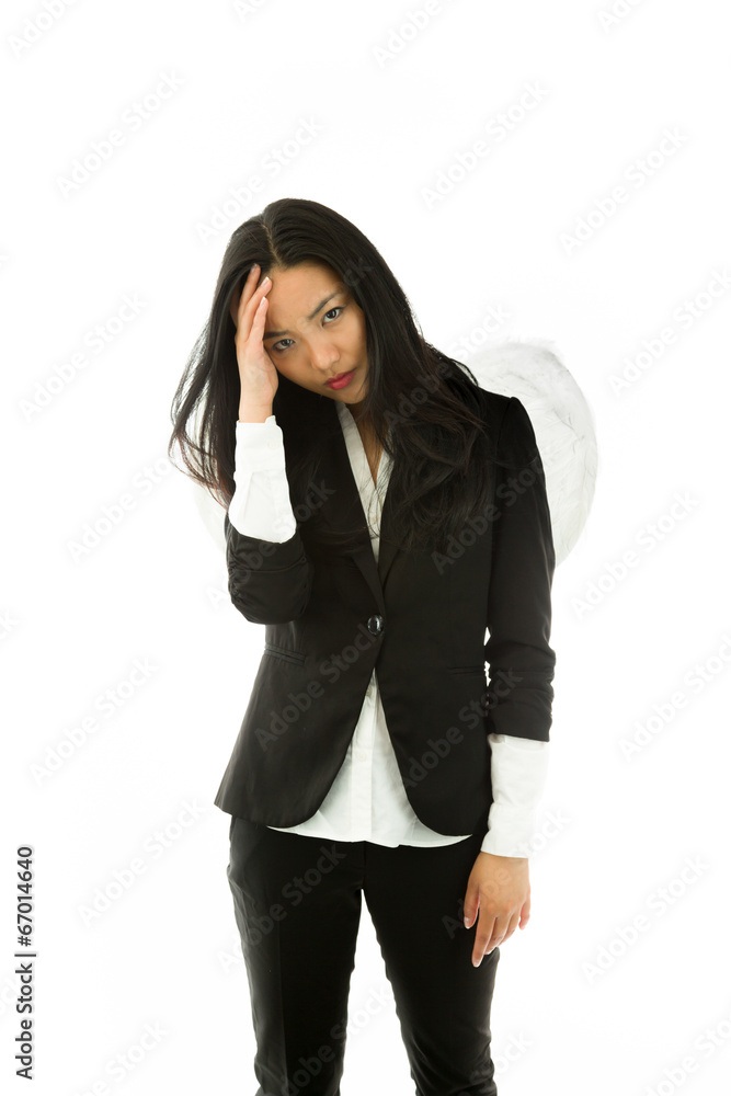 Stressed Asian young businesswoman dressed up as an angel Stressed Asian young businesswoman dressed up as an angel