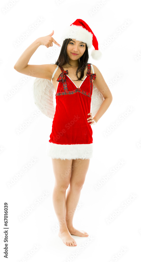 Asian young woman wearing Santa costume dressed up as an angel Asian young woman wearing Santa costume dressed up as an angel