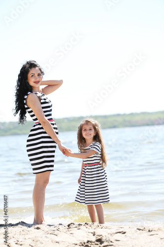 Happy mom and daughter on t...