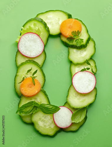 O letter made of raw vegetables