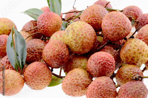 Fresh lychee fruits on a white background
