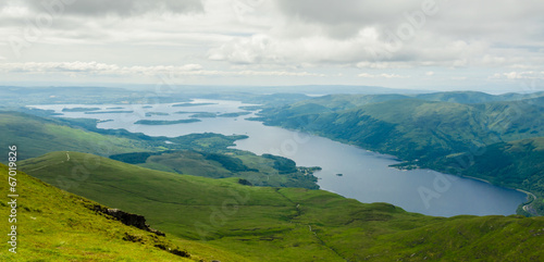 View of Loch Lomond from the top of Ben Lomond in a sunny  day. photo