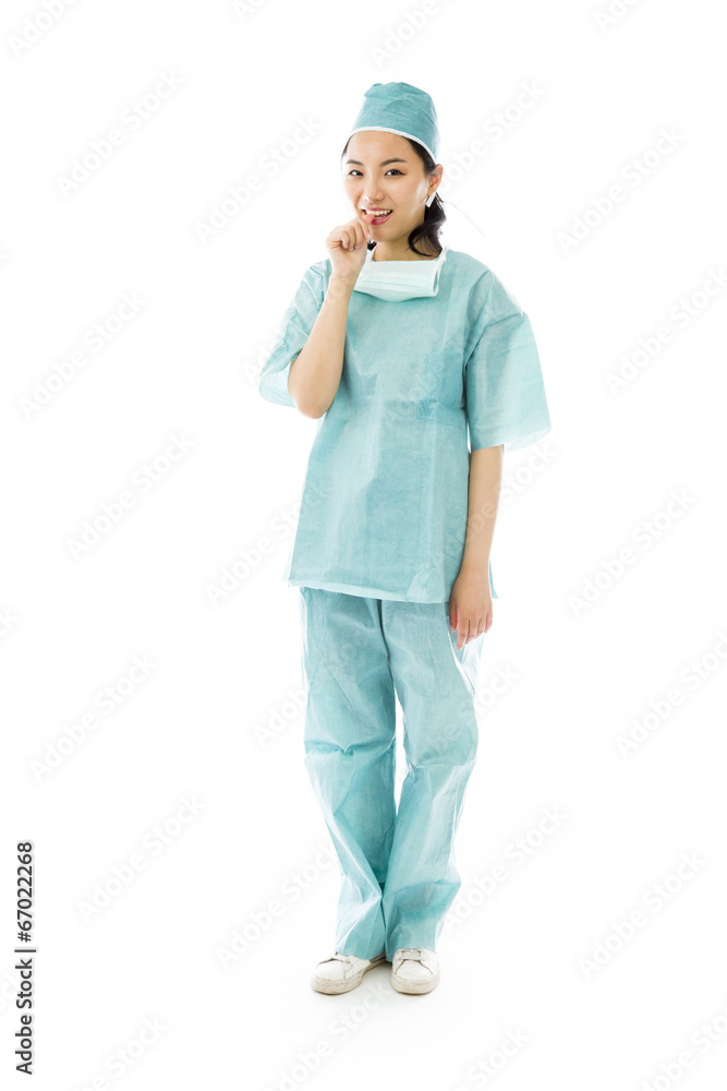 Asian female surgeon with finger in mouth Asian female surgeon with finger in mouth