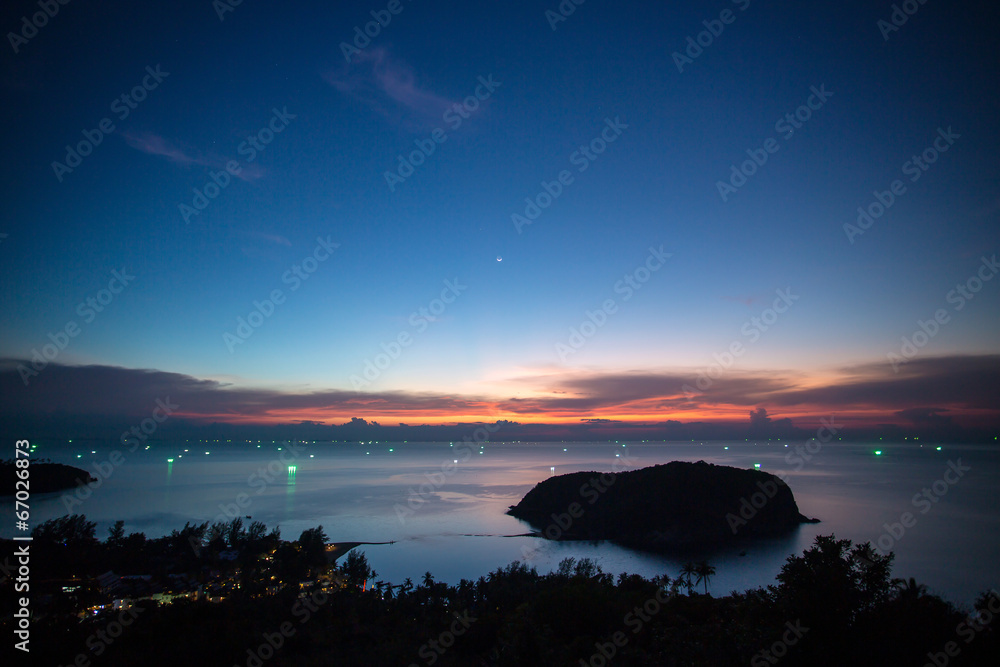 Sunset over the small Koh Ma island near Koh Phangan island in T