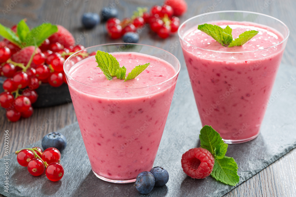 milkshake with fresh berries in a glass, horizontal milkshake with fresh berries in a glass, horizontal