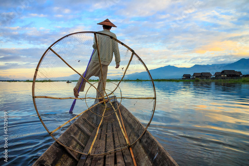 Fishermen in Inle Lake at sunrise, Shan State, Myanmar photo