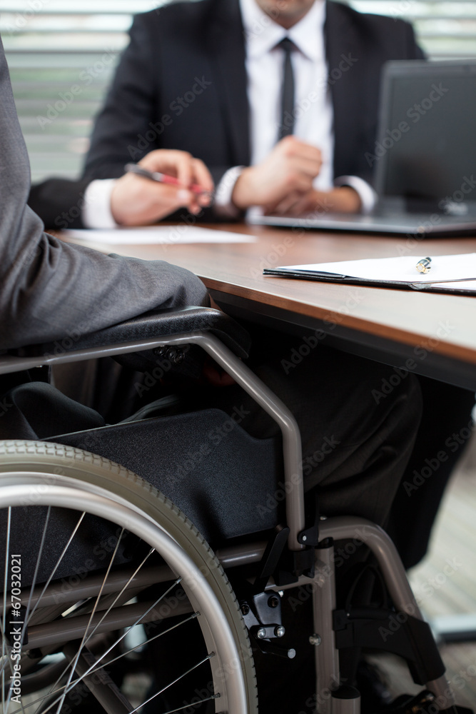 Fototapeta premium Man on wheelchair during conversation
